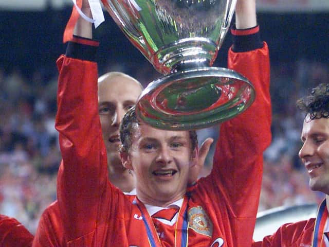 Ole Gunnar Solskjaer holds aloft the UEFA Champions League trophy. Photo: AFP via Getty Images