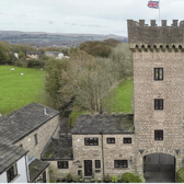 A characterful cottage inside a real-life castle tower is up for sale in Bury, Greater Manchester