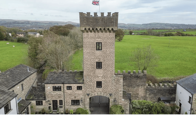 A characterful cottage inside a real-life castle tower is up for sale in Bury, Greater Manchester