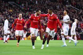 Fernandes and Rashford celebrate Fernandes’ first goal against Palace