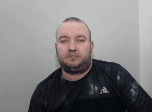 Ryan McElroy, of Apfel Lane in Chadderton, appeared at Manchester and Salford Magistrates on Thursday 8 December and was charged with two counts of Causing Serious Injury Dangerous Driving and Driving Whilst Disqualified. Credit: GMP