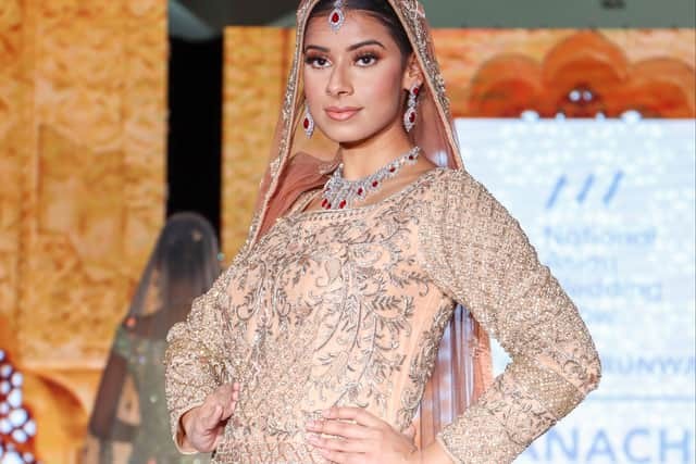 Miss Manchester Anita Saha modelling at the The National Asian Wedding Show. - the largest Asian wedding show in Europe. Credit: @a.star.productions_