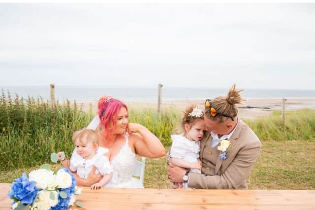 The Shaw family,  parents Ally and Jake with their daughters Teddi and Nala at their wedding in 2022. Photo: Ally and Jake Shaw