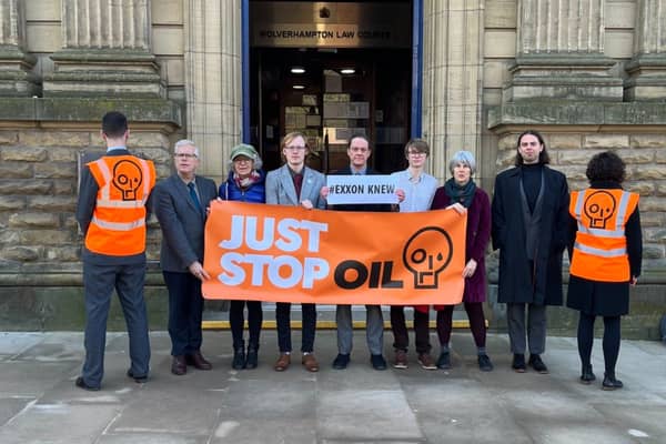 The Just Stop Oil protestors outside court, with Greater Manchester activists Alan Woods second from left, Paul Barnes holding the #Exxon Knew sign and Oliver Clegg standing to his right. Photo: Just Stop Oil