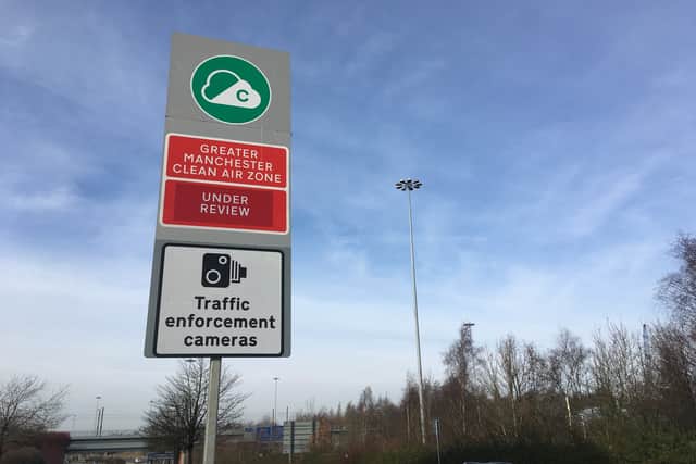Signs for the paused Clean Air Zone in Greater Manchester. Photo: LDRS