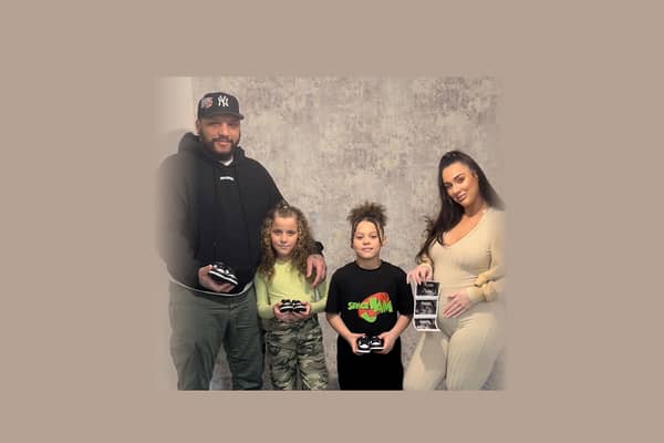 The family with the scan Credit: SWNS