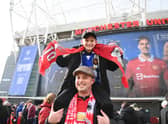 Fans outside Old Trafford Credit: Getty