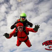 Tom Lowery, 76, leaping from the aircraft Credit: St Ann’s Hospice / SWNS/ Black Knights