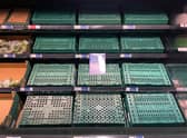 Empty shelves are seen in the fruit and vegetable aisles of a Tesco supermarket on February 22, 2023 in Burgess Hill.