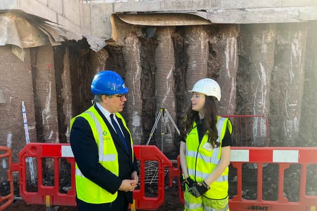 Cabinet Office Minister Jeremy Quin chats to site manager apprentice Elizabeth Holden, 21, on his ground-breaking visit to First Street, Manchester