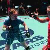 Izzy McGaughey (in blue) fighting in her gold medal match at the 2022 IMMAF World Championships in Serbia. Photo: IMMAF