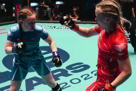 Izzy McGaughey (in blue) fighting in her gold medal match at the 2022 IMMAF World Championships in Serbia. Photo: IMMAF