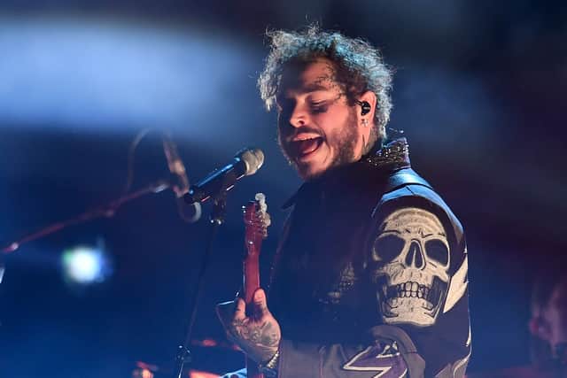 US rapper Post Malone performs onstage during the 61st Annual Grammy Awards on February 10, 2019, in Los Angeles. (Photo by Robyn Beck / AFP)        (Photo credit should read ROBYN BECK/AFP via Getty Images)