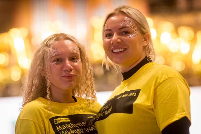 Amelia Merrill and Meg Eastwood taking part in the 2022 Manchester Midnight Walk. Photo: Chris Bull
