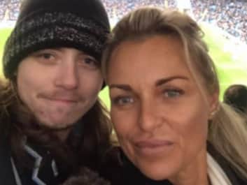 Jacob Reid Callaghan and his mother Louise watching his beloved Manchester City