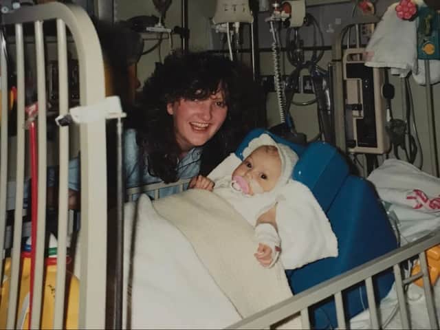 Hannah Logue as a baby with her mum Jacqueline MacPherson in hospital