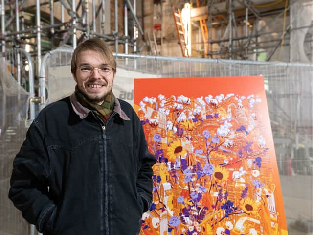 Artist Alex Sylt with his winning design. Photo: Edward Jones