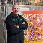 Norman Cook aka Fatboy Slim with the winning design for the new public artwork at Printworks in Manchester. Photo: Edward Jones