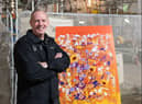 Norman Cook aka Fatboy Slim with the winning design for the new public artwork at Printworks in Manchester. Photo: Edward Jones