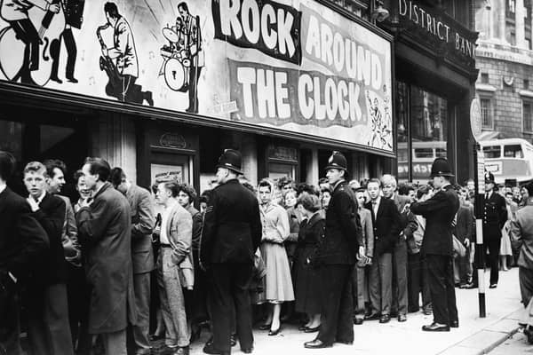 Fans queue outside the Gaiety Cinema to see ‘Rock Around the Clock,’ starring American rock and roll band Bill Haley and His Comets in 1956. The theatre was demolished in 1959 but there is now a blue plaque marking where it once stood on the corner of Peter Street and Mount Street.  (Photo by Express Newspapers/Getty Images)