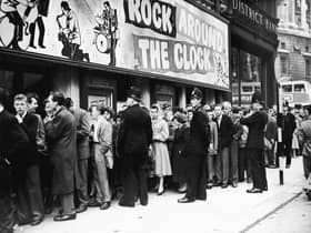 Fans queue outside the Gaiety Cinema to see ‘Rock Around the Clock,’ starring American rock and roll band Bill Haley and His Comets in 1956. The theatre was demolished in 1959 but there is now a blue plaque marking where it once stood on the corner of Peter Street and Mount Street.  (Photo by Express Newspapers/Getty Images)
