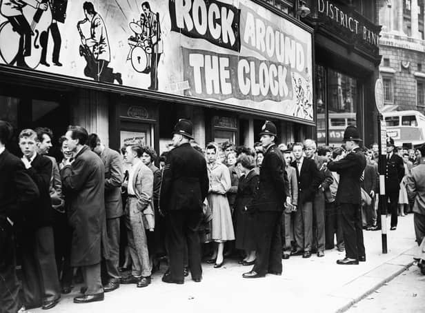 Fans queue outside the Gaiety Cinema to see ‘Rock Around the Clock,’ starring American rock and roll band Bill Haley and His Comets in 1956. The theatre was demolished in 1959 but there is now a blue plaque marking where it once stood on the corner of Peter Street and Mount Street.  (Photo by Express Newspapers/Getty Images)