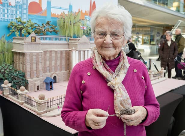 A 93-year-old great-great-gran who has a British Empire Medal (BEM) for her knitting has since created a massive 6ft Buckingham Palace out of wool.