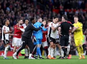 Fulham were shown three red cards in 40 seconds against Manchester United. Credit: Getty.