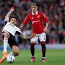 Lisandro Martinez and Harry Maguire both responded in different manners to  Aleksandar Mitrovic’s physical approach. Credit: Getty.