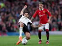 Lisandro Martinez and Harry Maguire both responded in different manners to  Aleksandar Mitrovic’s physical approach. Credit: Getty.