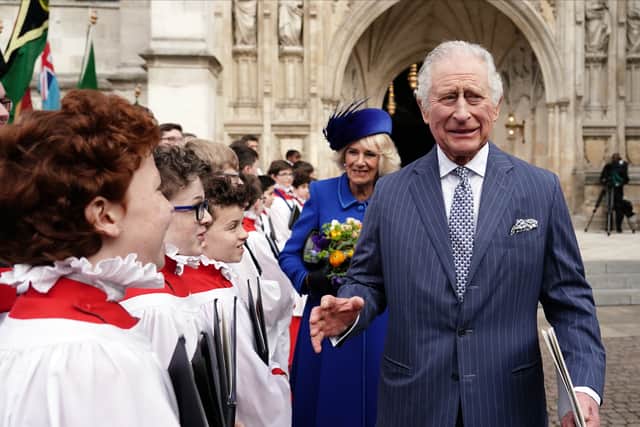 King Charles III and Queen Consort Camilla with choristers after a service at Westminster Abbey. Photo: Getty Images