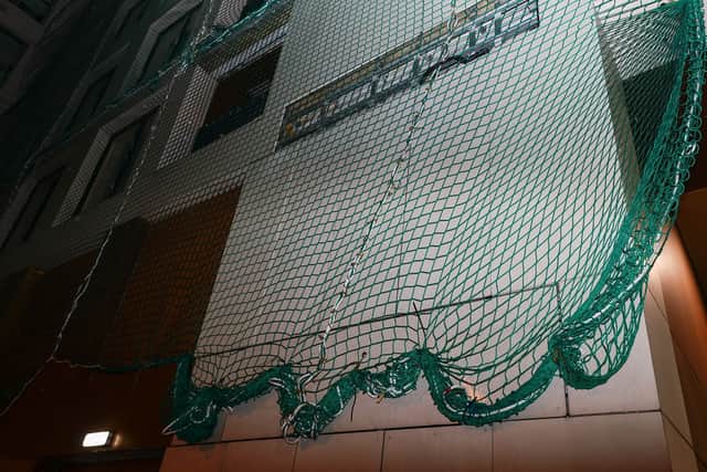 Netting on the outside of The Gateway preventing cladding from falling off. Photo: LDRS