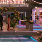 Kai and Sanam reading their ‘vows’ as part of the Love Island finale. (Credit ITV)