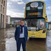 Mayor Andy Burnham with one of Manchester’s new Bee Network buses Credit: LDRS
