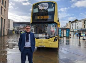 Mayor Andy Burnham with one of Manchester’s new Bee Network buses Credit: LDRS