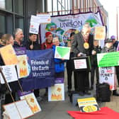 Protestors hold a mock award ceremony outside the Greater Manchester Pension Fund’s meeting. Photo: Fossil Free GM