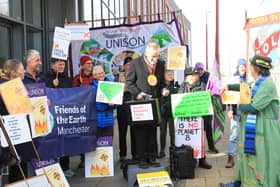 Protestors hold a mock award ceremony outside the Greater Manchester Pension Fund’s meeting. Photo: Fossil Free GM