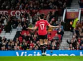 Lucia Garcia celebrates her first of two goals in front of the Old Trafford crowd. 