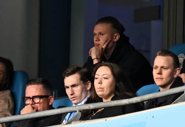 Erling Haaland watched Manchester City vs Liverpool from the stands. Credit: Getty.
