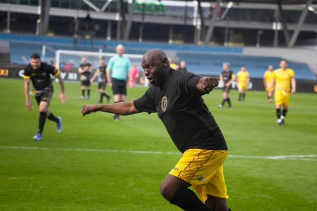 Former Manchester City star Shaun Goater celebrating scoring a goal