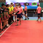 Manchester Raiders (in the black, green and red kit) shake hands with Edinburgh Eagles before a match in last season’s competition