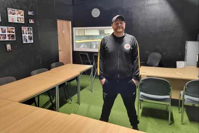 Carl Prince in the youth project classroom at Manchester Top Team. Photo: Andrew Nowell/NationalWorld