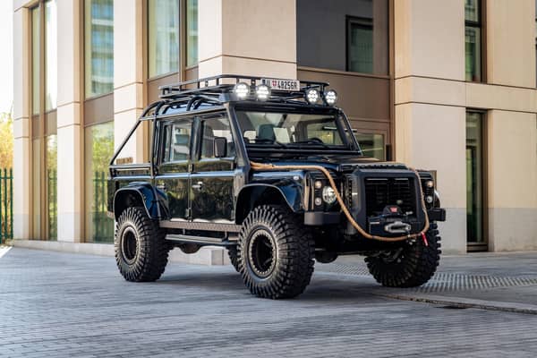 A 4x4 flipped over in a James Bond film is up for auction. The Land Rover Defender SVX was seen being taken out by the iconic spy in 2015's Spectre. 