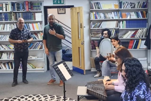 Sahba Music Academy founder Masoud Ghasemi watching on at an ensemble rehearsal. Photo: Andrew Nowell/NationalWorld