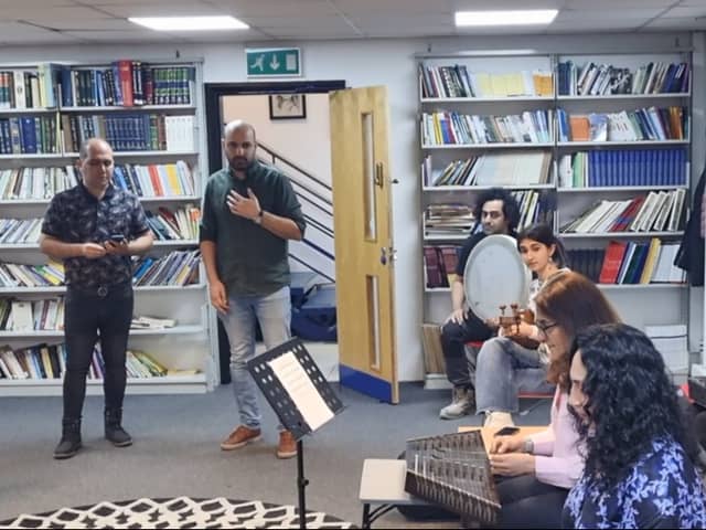 Sahba Music Academy founder Masoud Ghasemi watching on at an ensemble rehearsal. Photo: Andrew Nowell/NationalWorld