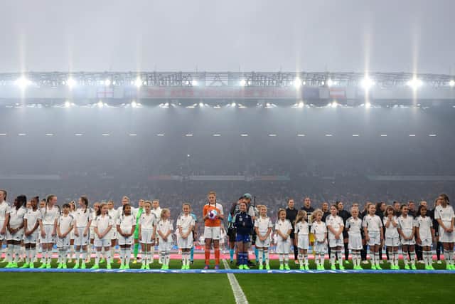 MANCHESTER, ENGLAND - JULY 06: Players Mascot during the UEFA Women's EURO 2022 group A match between England and Austria at Old Trafford on July 06, 2022 in Manchester, England. (Photo by Catherine Ivill - UEFA/UEFA via Getty Images)