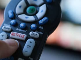 With tough competition from fellow streaming services, Netflix is dedicated to cracking down on password sharing amongst its users (Photo by CHRIS DELMAS/AFP via Getty Images)