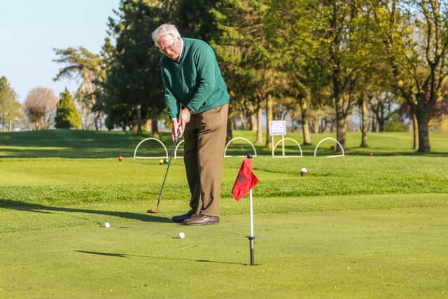 Derek Jackson at Evesham Golf Course Credit: SWNS