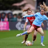 Laia Aleixandri of Manchester City battles for possession with Victoria Pelova of Arsenal during the FA Women's Super League match between Arsenal and Manchester City at Meadow Park on April 02, 2023 in Borehamwood, England