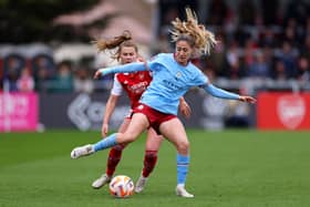 Laia Aleixandri of Manchester City battles for possession with Victoria Pelova of Arsenal during the FA Women's Super League match between Arsenal and Manchester City at Meadow Park on April 02, 2023 in Borehamwood, England